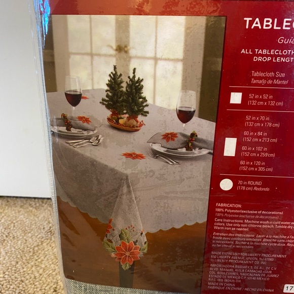 Holiday tablecloth, poinsettia, 60x102, oblong, new in package. - Picture 2 of 4